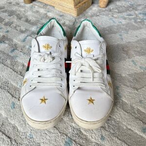 White Sneakers with Gold Star Accents